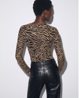 Μακρυμάνικο Κορμάκι με Zebra Print & Διακριτική Λάμψη