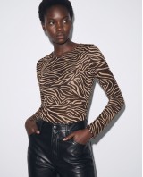 Μακρυμάνικο Κορμάκι με Zebra Print & Διακριτική Λάμψη