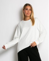 Μπλούζα φούτερ αχνούδιαστο πιο κοντή μπροστά κομμένη στο τελείωμα εκρού