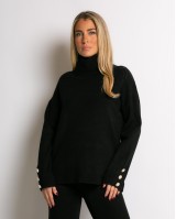 Σετ πλεκτό μπλούζα με σχέδιο στο μανίκι και παντελόνι μαύρο