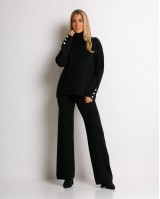 Σετ πλεκτό μπλούζα με σχέδιο στο μανίκι και παντελόνι μαύρο