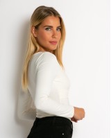 Κορμάκι μακρυμάνικο με λεπτομέρεια στο V εκρού