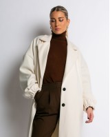 Παλτό με φόδρα και λάστιχο στο μανίκι εκρού
