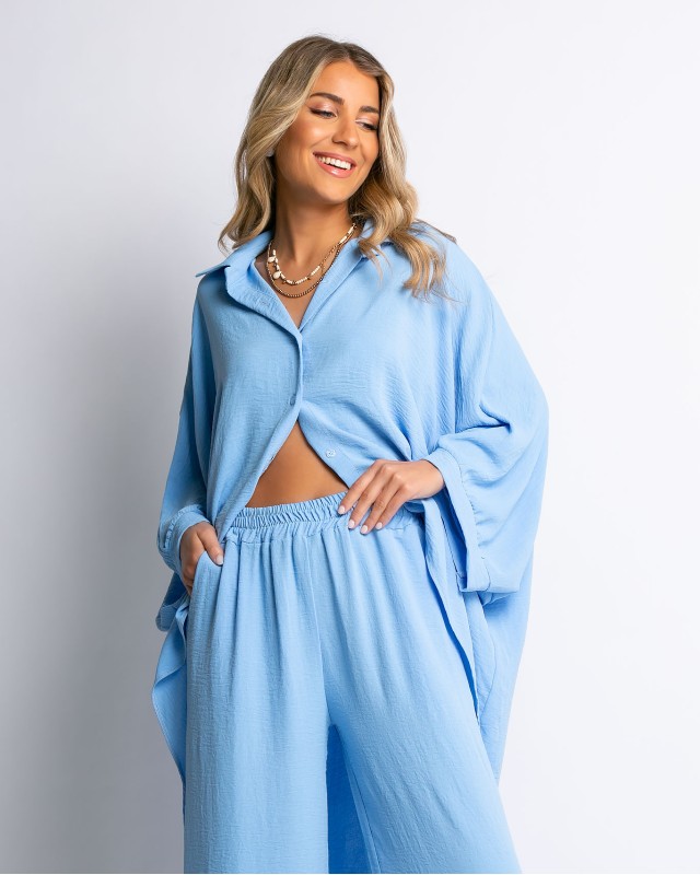 Σετ ασύμμετρη πουκαμίσα και παντελόνα baby blue Σετ ασύμμετρη πουκαμίσα και παντελόνα baby blue