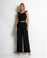 Σετ crop top με βολάν και παντελόνα μαύρο Σετ crop top με βολάν και παντελόνα μαύρο