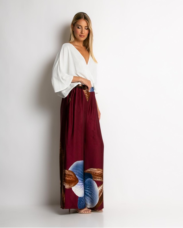 Παντελόνα με floral print μπορντώ Παντελόνα με floral print μπορντώ
