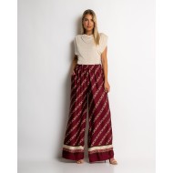 Παντελόνα με chain print μπορντώ