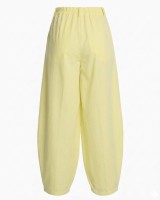 Παντελόνα carrot fit με κούμπωμα στο πλάι yellow