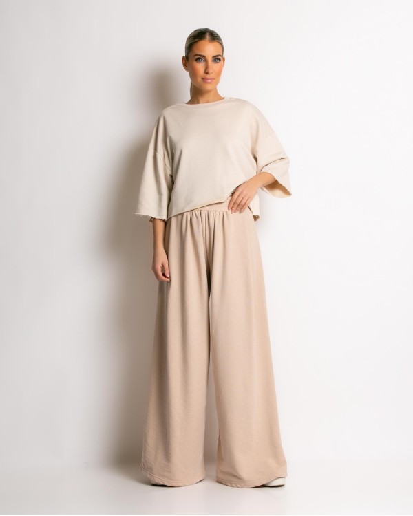 Παντελόνι φούτερ αχνούδιαστο σε φαρδιά γραμμή μπεζ