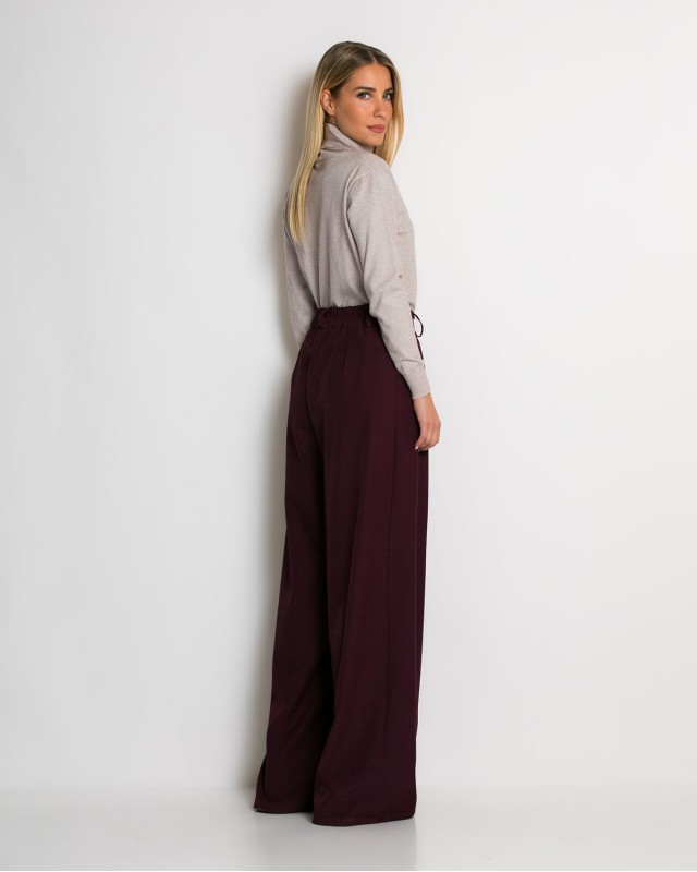 Παντελόνα με κούμπωμα στο πλάι δαμασκηνί