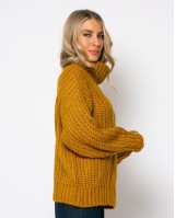 Πλεκτό ζιβάγκο με κοτσίδα μουσταρδί